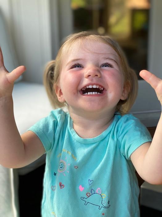 young girl laughing & smiling l dentist apple valley mn