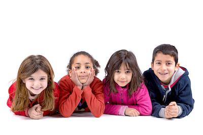 group of four children smiling | pediatric dentist apple valley mn