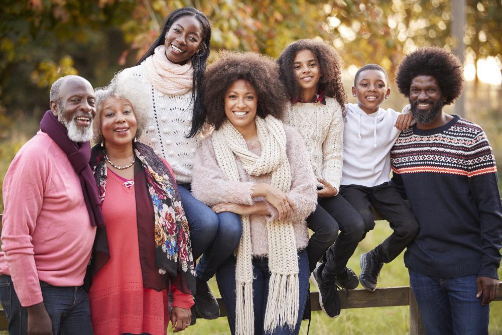 large family at fence outside | interceptive orthodontics apple valley mn