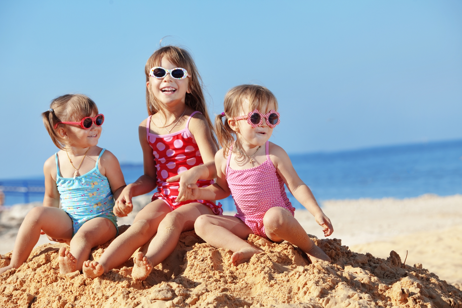 group of children playing on beach | carousel pediatric apple valley