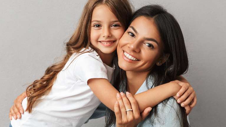 mother with young child hugging | preventive dental care apple valley