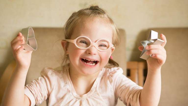 child with down syndrome laughing | childrens special health care dentistry apple valley