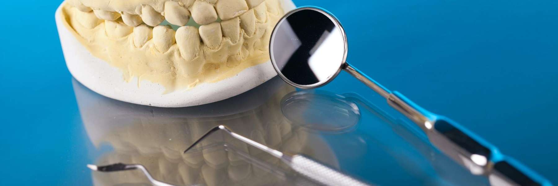 mouth mold with dental tools | carousel pediatric dentistry & orthodontics