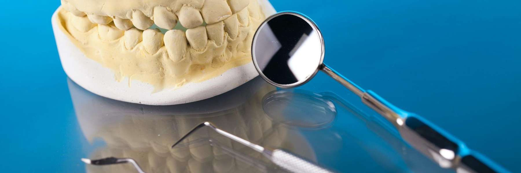 close up of dental tool with mouth mold | pediatric dentistry apple valley mn