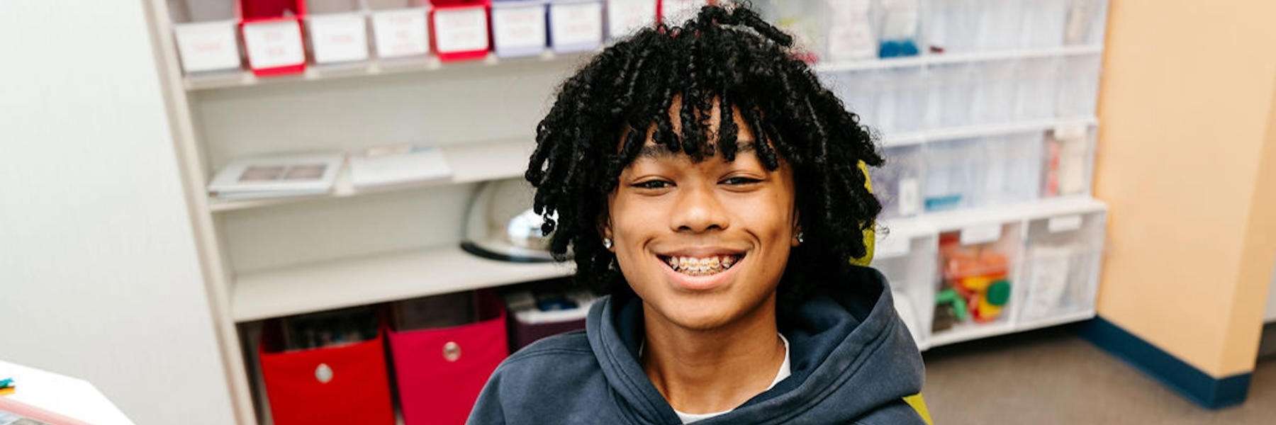 teenager with braces smiling | orthodontics apple valley mn