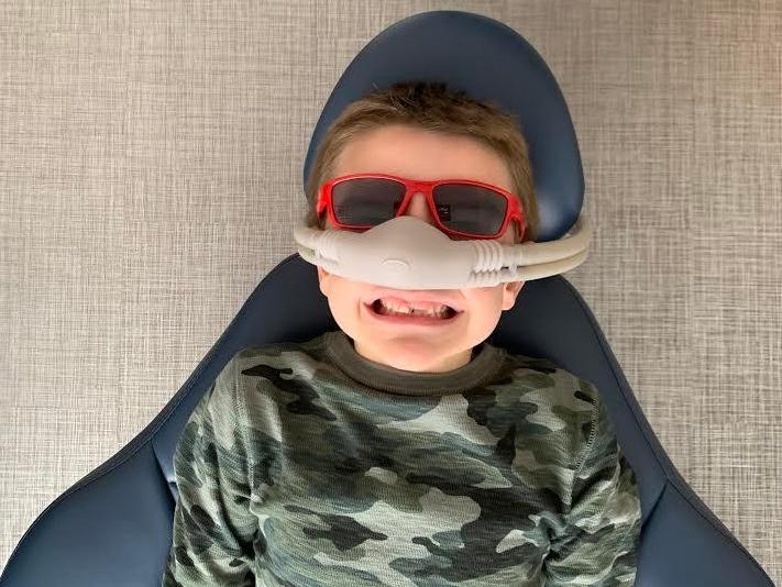 close up of child with nitrous oxide l dentist apple valley mn